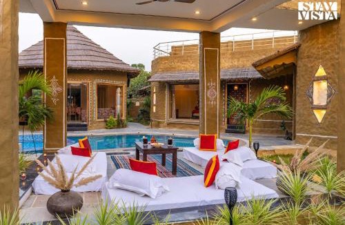 Ajmer Villa | StayVista's Majestic Mud House - Rajasthani Architecture with Modern Amenities, Outdoor Pool, Adventure Activities, and Spa