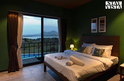 Dindori Villa | StayVista's Minty Mirage - Mountain & Lake-View Villa with Pool, Expansive Lawn & Terrace