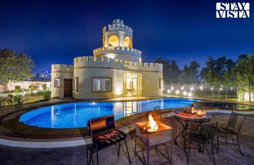 Jaipur Villa | StayVista's Mystic Castle with Terrace, Swimming Pool, Lawn with Gazebo