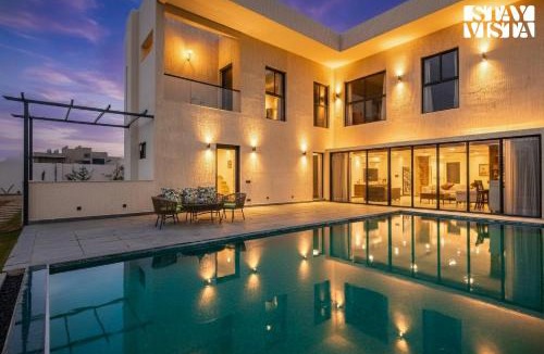 Gurugram Villa | StayVista's The Sweet Life - Luxury Farm stay with Private Pool & Fireplace