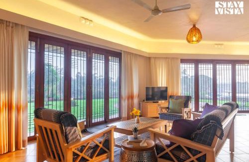 Vada Villa | StayVista's Waterway Retreat - Lakeside Oasis with Infinity Pool