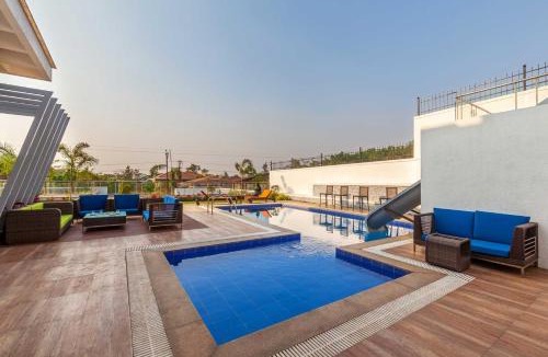 Kune Village Villa | StayVista's White Pebbles - A Villa with Theater Room & Swimming Pool