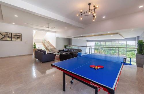 Kune Village Villa | StayVista's White Pebbles - A Villa with Theater Room & Swimming Pool
