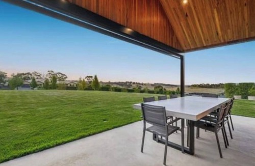 Orange House | Sunset Ridge Retreat - a stunning, spacious 5 bedroom home with pool and views