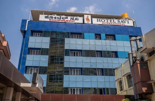 Sheshadripuram Hotel | Super OYO Capital O Savi International Near Bengaluru Palace