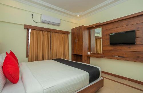 Sheshadripuram Hotel | Super OYO Capital O Savi International Near Bengaluru Palace