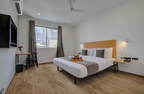 RR Nagar Hotel | Super Townhouse Global Village Tech Park Near Kengeri Bus Terminal Metro Station