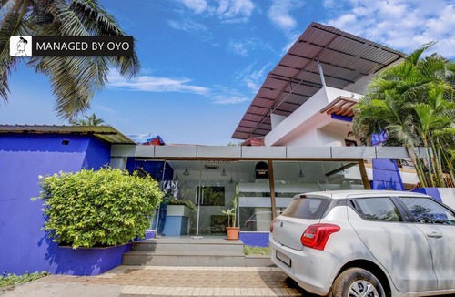 Candolim Hotel | Super Townhouse OAK BLUEBELL BEACH RESORT