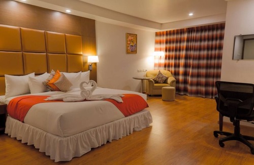 Mysore Hotel | The Atrium Boutique hotel with 1 bedroom and AC, WiFi in charming Mysore