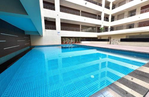 Sainagar Apartment | The Candolim Calm - Coastal 1BHK for Couples & Families with Pool Access