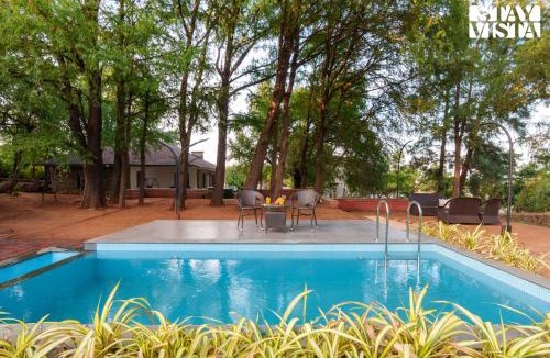 Bajarwadi Villa | The Deck by StayVista - Country house architecture with Valley View