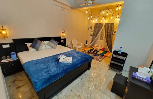 Banjara Hills Apartment | The Hidden Gem - 1BHK with Indoor Canopy, Ambient Lighting, Wifi, Smart TV & AC