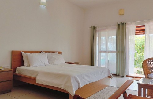 Varkala Bed & Breakfast | The Ixora - A Boutique Homestay