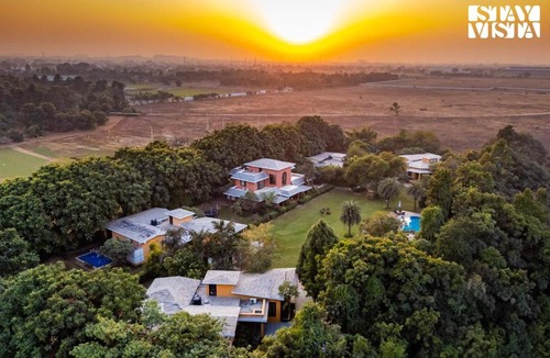 Bhiwadi Villa | The Manvi Estate - Gurugram by StayVista - 10BHK with Pet Friendly & Private Pool
