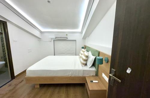 Sainagar Apartment | The Neon House - Curated 2BHK Duplex with Pool