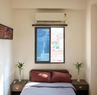 Lake Swaroop Sagar Apartment | TicAna Large 1Bedroom Living Kitchen with AC , fiber wifi Rooftop garden lake view