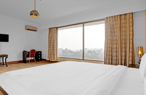 Aarey Colony Hotel | Townhouse 799 Royal Palms Hotel - Lily Collection