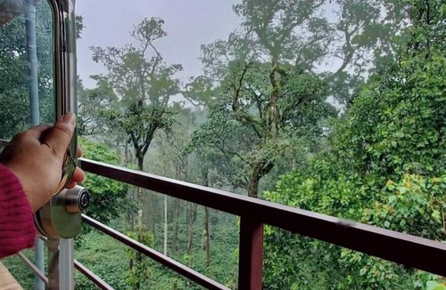 Madikeri House | Tranquil Glass House By Coorg Tree House