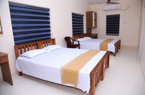 Kochi Hotel | Travancore Tourist Home