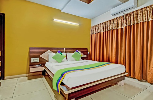 Nagavara Hotel | Treebo Premium Raj Elegance Manyata Tech Park