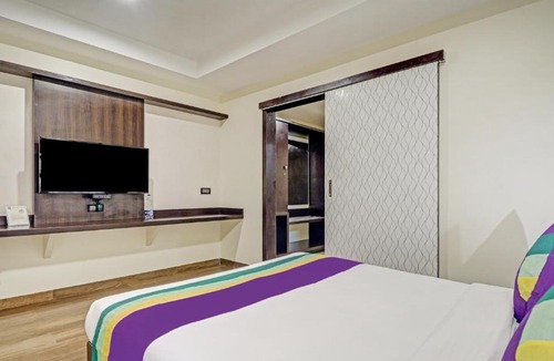 RR Nagar Hotel | Treebo Premium Raj Vista Global Village
