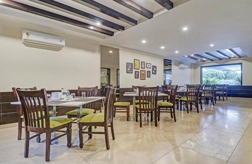 RR Nagar Hotel | Treebo Premium Raj Vista Global Village