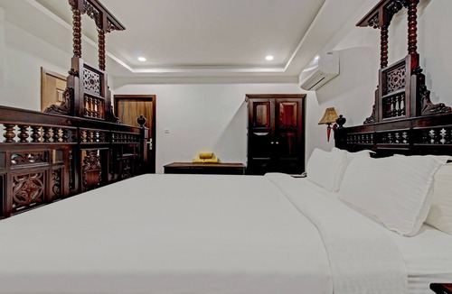 Cherthala Hotel | Treebo Premium Travancore Palace Cherthala