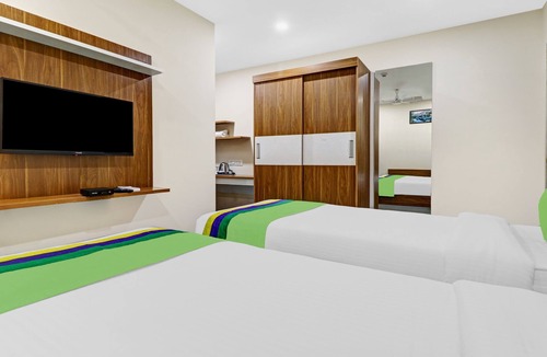 5th Block Hotel | Treebo Purple Orchid Boutique