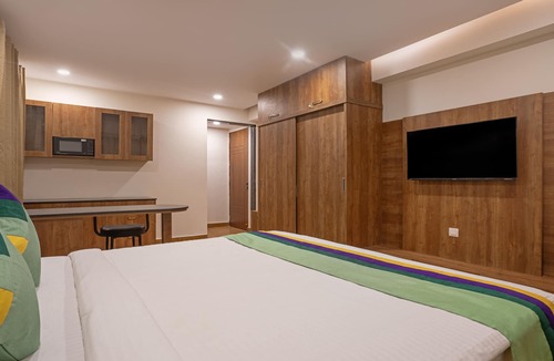Gachibowli Hotel | Treebo Purva Crest, Gachibowli DLF