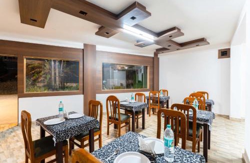 Mahadevpet Hotel | Treebo Regalia Comforts, 5 mins to Raja Seat Garden