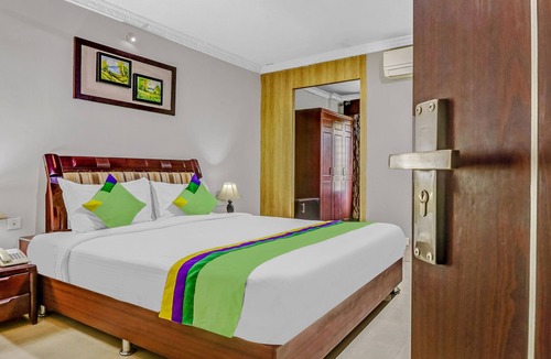 Irinjalakuda Hotel | Treebo Symphony Hotels And Resorts Angamally