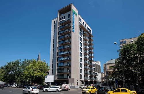 Bucharest Apartment | Urban Amethyst Haven - 1BR Apartment with Balcony