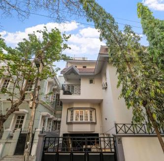 Koramangala House | Urban Escape 4BHK Luxury Villa & Sunflower Skyline 2BHK Penthouse By Spacez