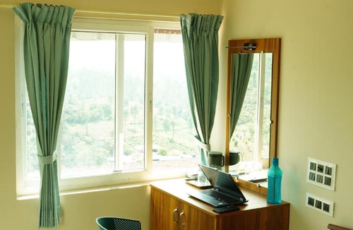 Valparai Hotel | Vasu Inn - Rooms in Valparai