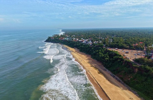 Varkala Hotel | VOYE HOMES Signature Pool Resort Varkala , Just 950 m from Varkala Cliff and Beach