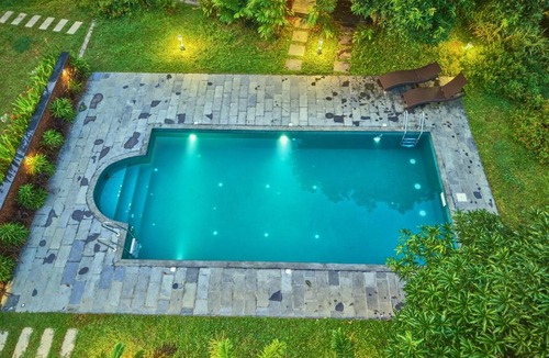 Varkala Hotel | VOYE HOMES Signature Pool Resort Varkala , Just 950 m from Varkala Cliff and Beach