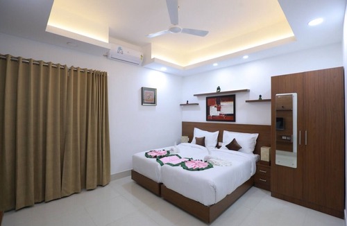 Karumom House | Welcome to our exquisite hotel suits nestled in the heart of Trivandrum