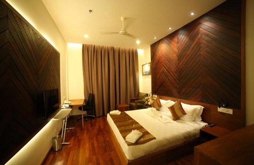 Kozhikode Hotel | Woodies Bleisure Hotel