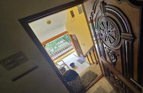 Coimbatore House | Woodland Cottage by Vstays