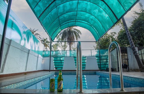 Khatri Park Housing Society Villa | Your private oasis awaits - a 4 BHK villa with a pool near the city."