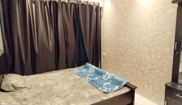 1BHK flat fully furnished bedroom, hallway with single bed balconies.