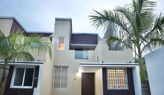 2BHK leisure home near Auroville featuring a shared community pool