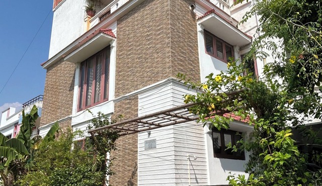2BHK rooms for family and friends at Kovalam with nearby backwater and beach.