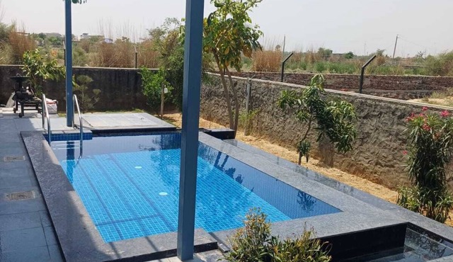 2BHK villa in 16k sqft farmhouse wth view f mini forest nd arawali mountain rnge