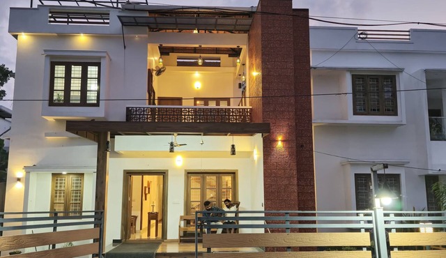 4-bedroom villa in charming Alappuzha with AC, WiFi. Relax and unwind.