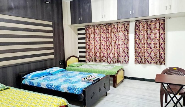 5 minutes walk to Rela 7 minutes drive to Airport AC Kitchen Bedroom3