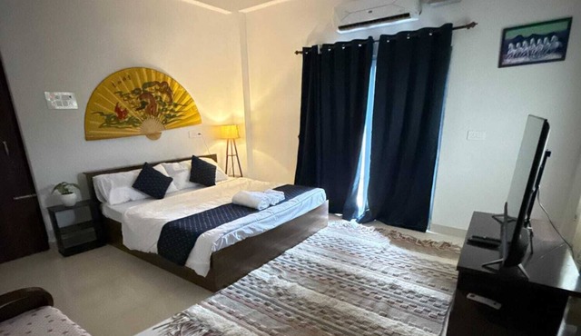 A modern, artsy 2BHK with a splash of boho charm.