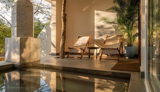A nature immersive twelve cottage estate in Udaipur with ultra luxury amenities