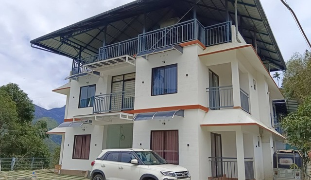 A perfect Homestay with Wi-Fi has 8 Bed Rooms with balcony in Munnar