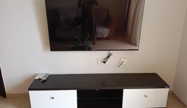 AC 1bhk furnished flat towards highway view in Lodha Belmondo, Pune